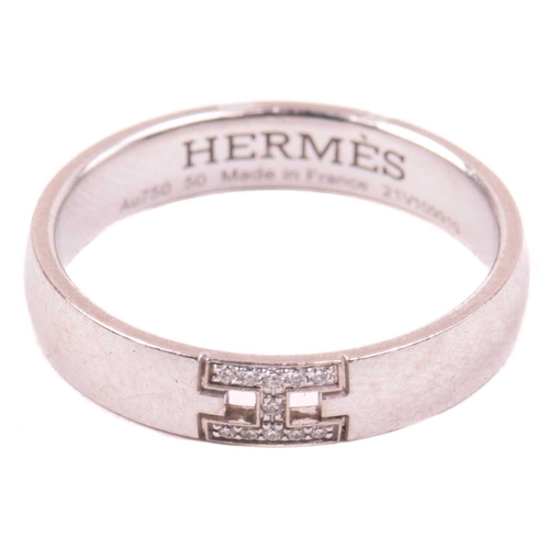 167 - Hermès - an 'Ever Herakles' wedding band set with diamonds, composed of a court-profile band, embell... 