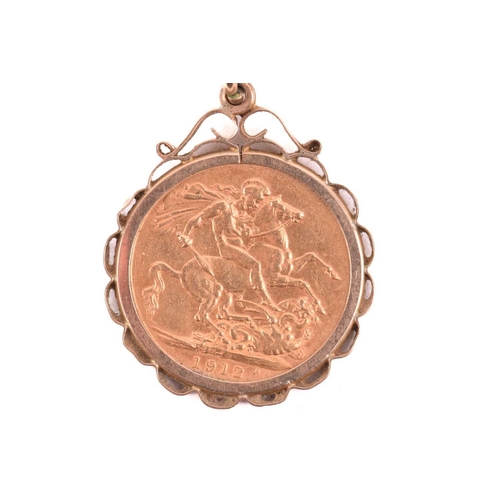168 - A George V full sovereign pendant on chain; dated 1912, in 9ct gold scalloped mount, to an associate... 