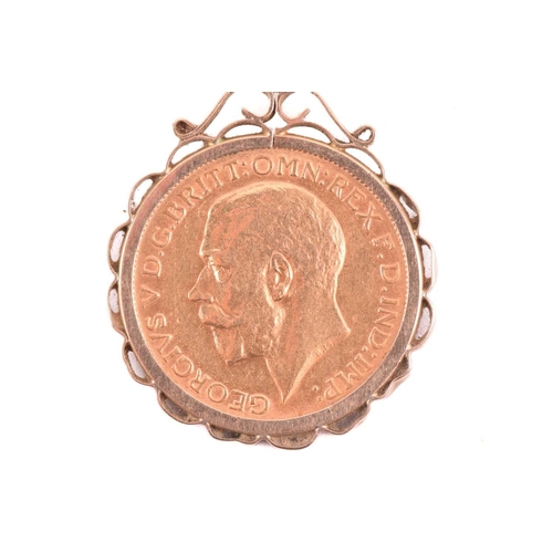 168 - A George V full sovereign pendant on chain; dated 1912, in 9ct gold scalloped mount, to an associate... 