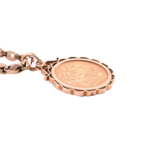 168 - A George V full sovereign pendant on chain; dated 1912, in 9ct gold scalloped mount, to an associate... 