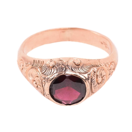177 - An Edwardian single stone garnet ring by Ostby & Barton, set with an almandine garnet, measuring 7.8... 