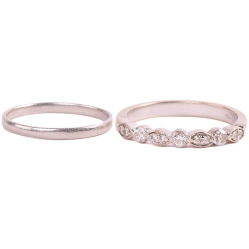 18 - A diamond half hoop eternity ring set with brilliant cut diamonds, with a total estimated diamond we... 