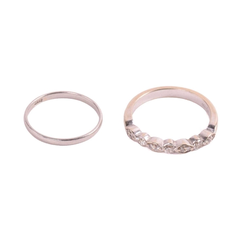 18 - A diamond half hoop eternity ring set with brilliant cut diamonds, with a total estimated diamond we... 