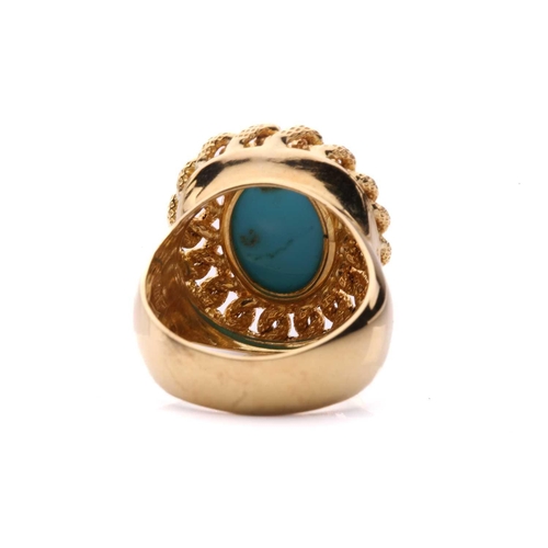 2 - A turquoise dress ring, centred with an oval turquoise cabochon, collet set within a textured curb l... 