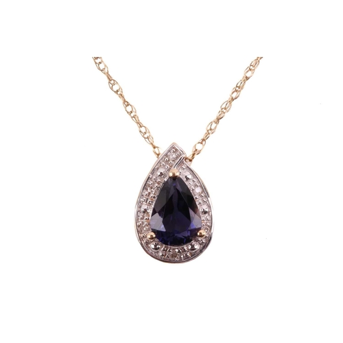 20 - An iolite and diamond drop shape pendant, the central pear shape iolite measuring 7.8mm x 5.6mm, wit... 