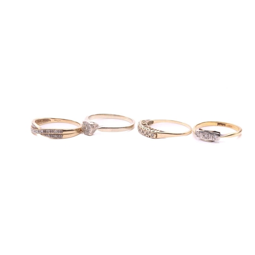 24 - Four diamond rings; a three stone ring with a total estimated diamond weight of 0.06ct, marked 18ct,... 