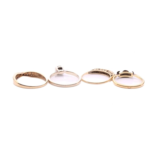 24 - Four diamond rings; a three stone ring with a total estimated diamond weight of 0.06ct, marked 18ct,... 