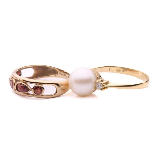 246 - A garnet ring in 9ct gold together with a pearl ring; the first alternating with pear-cuts and circu... 