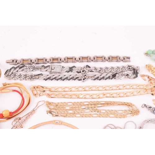 247 - A large collection of jewellery in base metal, including pendants, earrings and rings, and further b... 