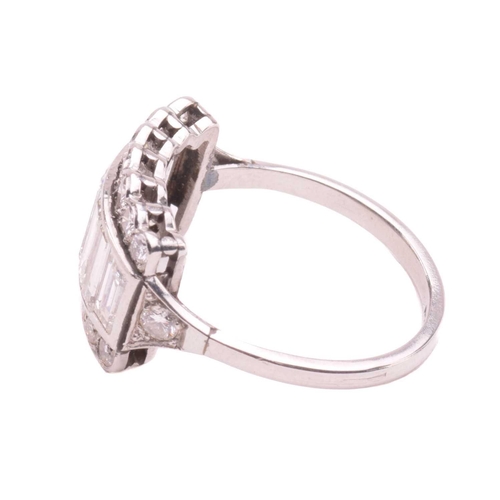249 - A diamond ring, set with a central row of baguette cut diamonds between rows of round brilliant cut ... 