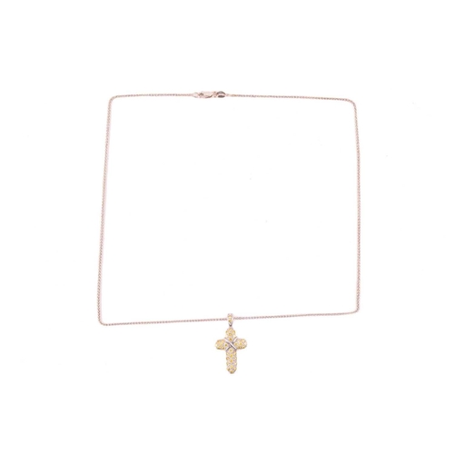 252 - A yellow diamond cross pendant, set with round brilliant cut yellow diamonds with a total diamond we... 