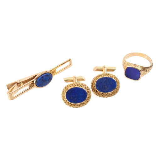 255 - A pair of lapis lazuli cufflinks with filigree surround, marked 'Italy 18k', a lapis lazuli signet r... 