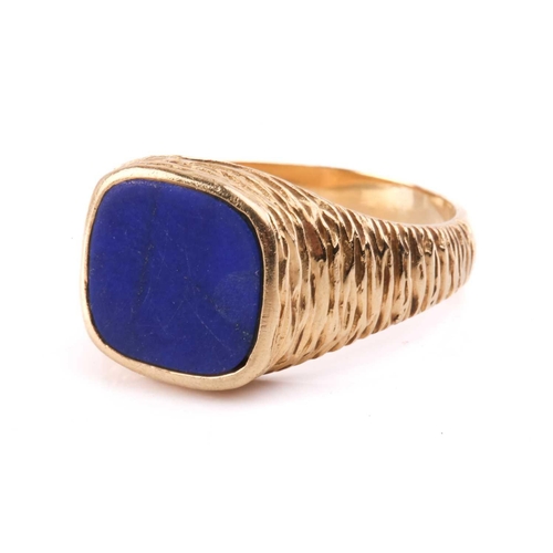 255 - A pair of lapis lazuli cufflinks with filigree surround, marked 'Italy 18k', a lapis lazuli signet r... 