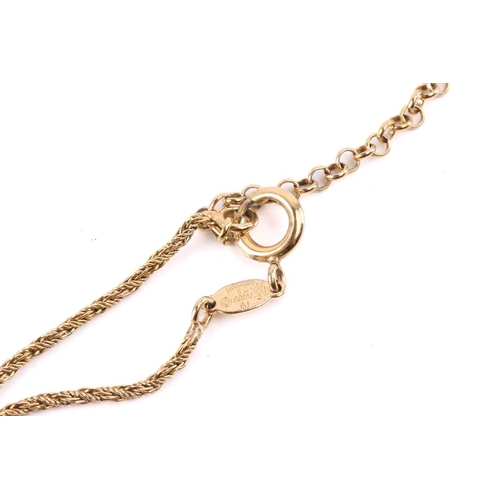 257 - A ruby and pearl cluster pendant on chain, the octagonal pendant centred with a ruby and pearl clust... 