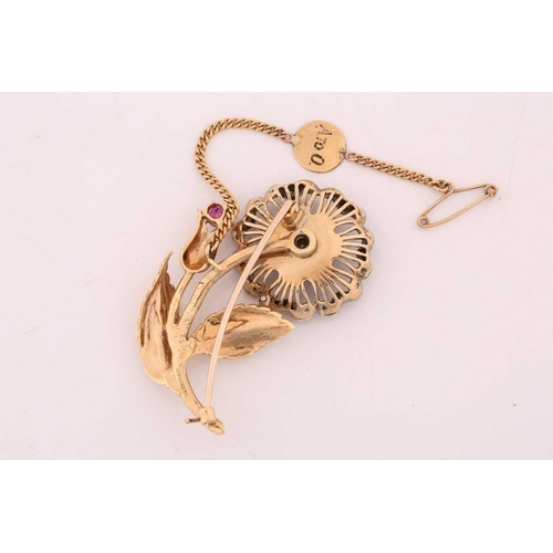 259 - A gem-set flower spray brooch in 18ct gold, the wirework flowerhead edged with diamond accents, cent... 