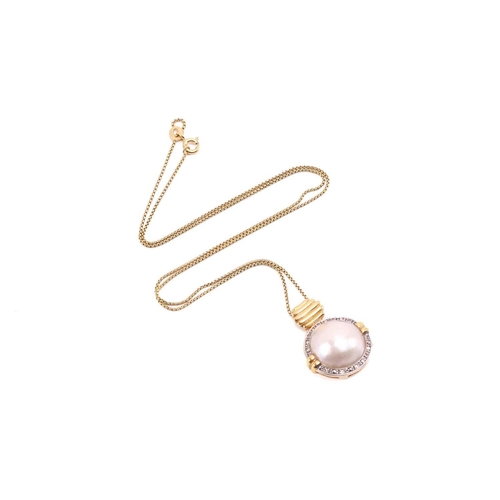 260 - A mabé pearl and diamond pendant on chain, featuring a round mabé pearl within a diamond-set surroun... 