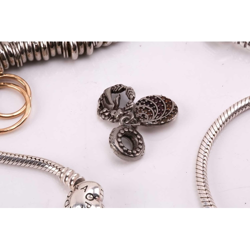 263 - Pandora and Links of London silver charm bracelets and few others; comprising two snake chain Pandor... 