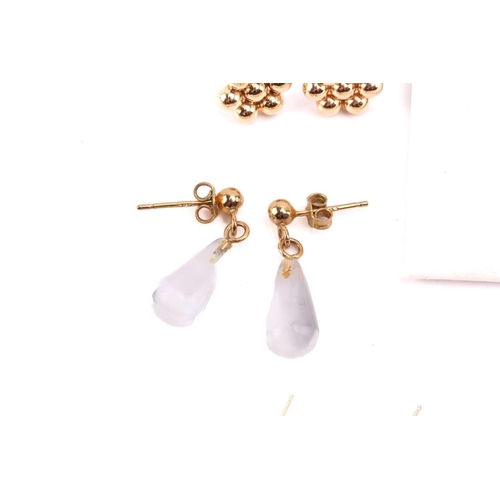 264 - Twelve pairs of earrings and a ruby set pendant. The first pair of stud earrings comprise a heart sh... 