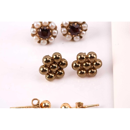264 - Twelve pairs of earrings and a ruby set pendant. The first pair of stud earrings comprise a heart sh... 