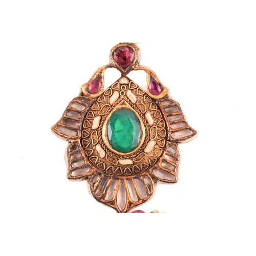 265 - An Indian polychromatic gem-set necklace and earrings ensuite; the pendant with a cream-coloured ena... 