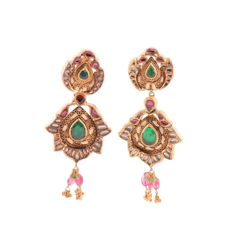 265 - An Indian polychromatic gem-set necklace and earrings ensuite; the pendant with a cream-coloured ena... 