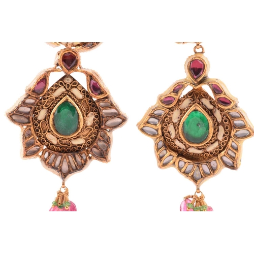 265 - An Indian polychromatic gem-set necklace and earrings ensuite; the pendant with a cream-coloured ena... 