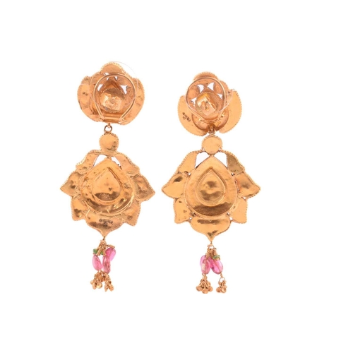 265 - An Indian polychromatic gem-set necklace and earrings ensuite; the pendant with a cream-coloured ena... 