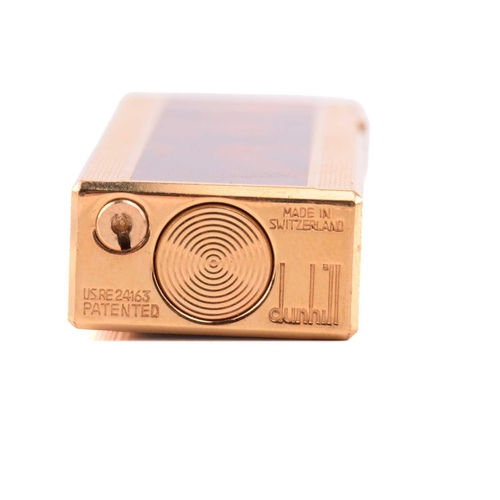 269 - Dunhill - collectors' lot comprising a lighter, a fountain pen and a watch; the Rollagas lighter wit... 
