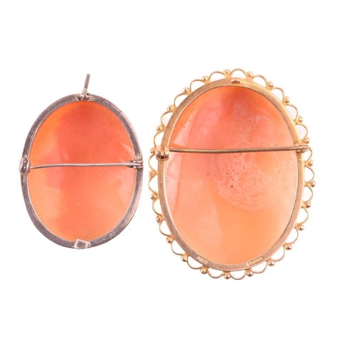 270 - An onyx and seed pearl brooch with a scrolling foliate design, marked 14k to the reverse, an oval sh... 