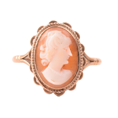 270 - An onyx and seed pearl brooch with a scrolling foliate design, marked 14k to the reverse, an oval sh... 