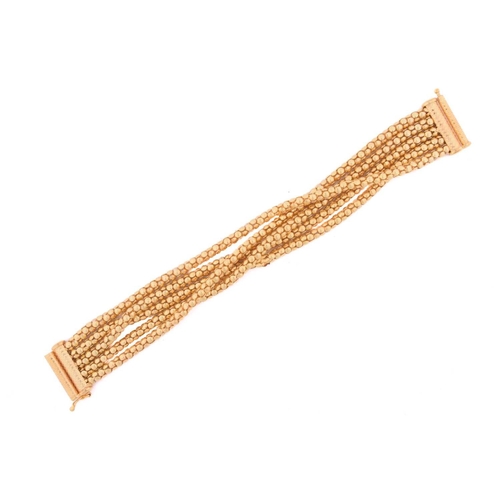 281 - A popcorn link bracelet in 9ct yellow gold, comprising five rows of popcorn links, fastened with a f... 