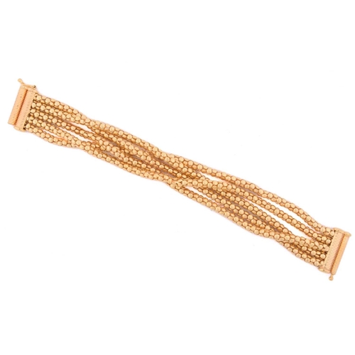 281 - A popcorn link bracelet in 9ct yellow gold, comprising five rows of popcorn links, fastened with a f... 