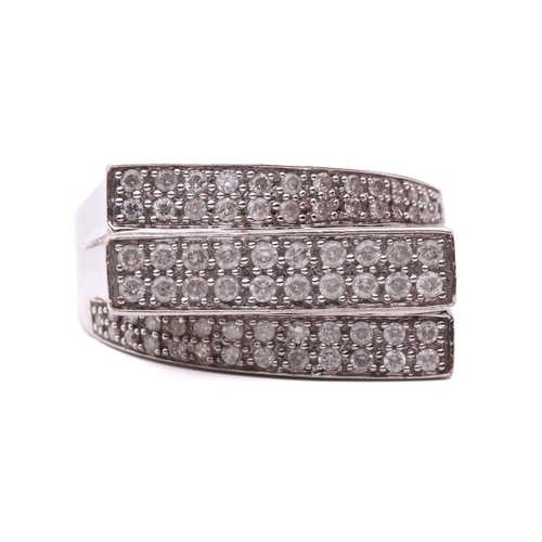 282 - A diamond ring, set with six rows of round brilliant cut diamonds, with a total estimated weight of ... 