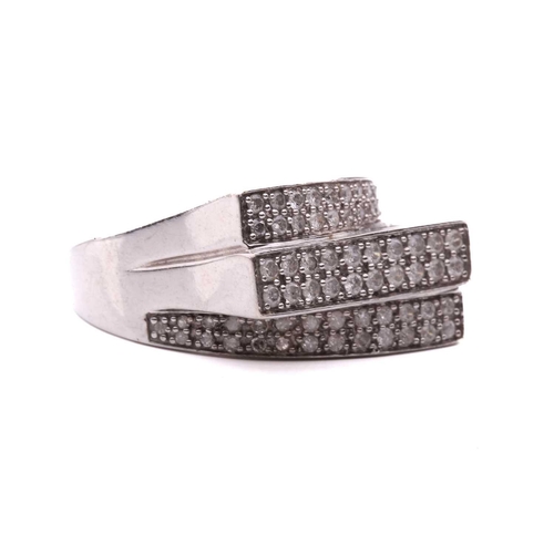 282 - A diamond ring, set with six rows of round brilliant cut diamonds, with a total estimated weight of ... 