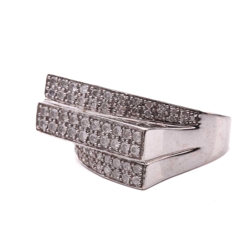 282 - A diamond ring, set with six rows of round brilliant cut diamonds, with a total estimated weight of ... 
