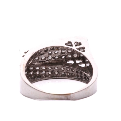 282 - A diamond ring, set with six rows of round brilliant cut diamonds, with a total estimated weight of ... 