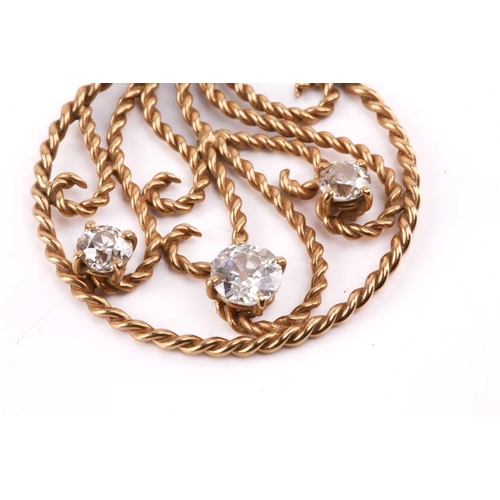 288 - A diamond pendant, set with three old cut diamonds with a total estimated weight of 1.35ct, to a cir... 