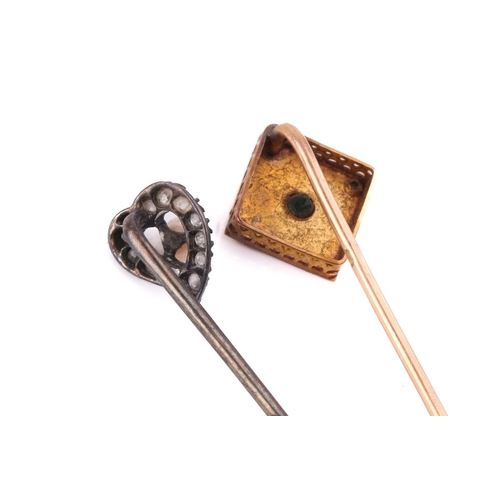 289 - A Victorian heart-shaped diamond and pearl stick pin together with an emerald and diamond stick pin.... 