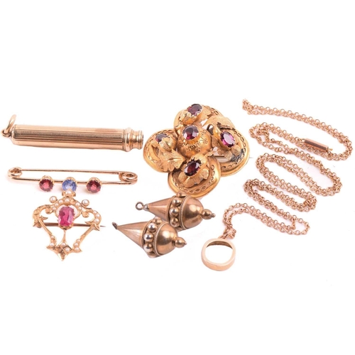 29 - A small collection of jewellery items; to include a Victorian garnet brooch, of quatrefoil form, set... 