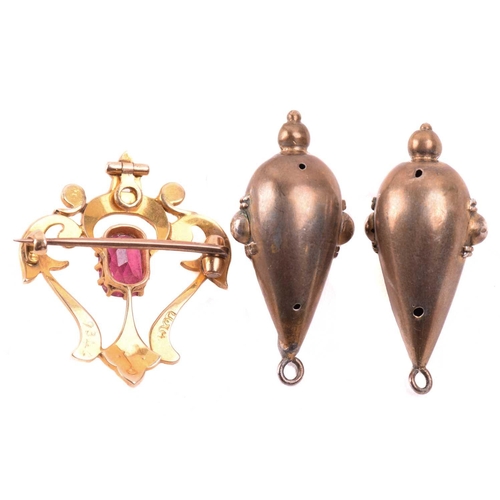 29 - A small collection of jewellery items; to include a Victorian garnet brooch, of quatrefoil form, set... 