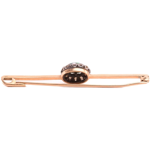 296 - A French gem-set bar brooch and a 9ct rose gold curb link bracelet; the bar brooch is centred with a... 