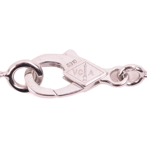 299 - Van Cleef & Arpels - an 18ct white gold and onyx 'Alhambra' pendant on chain, comprising the iconic ... 