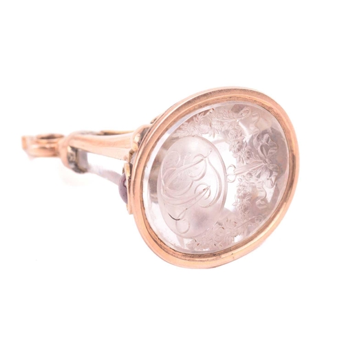 3 - A group of three 19th-century seal fobs; including a rock crystal three-sided swivel fob seal, one o... 