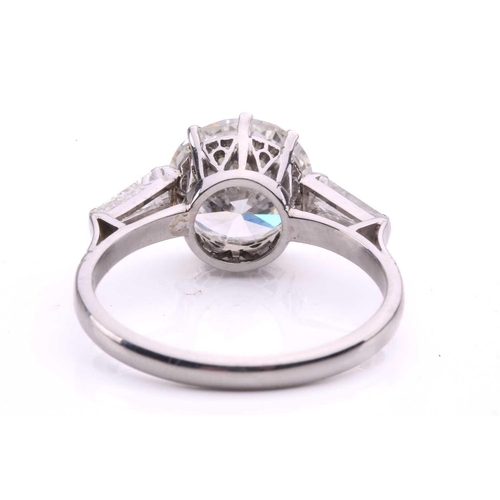 301 - A diamond solitaire ring, set to the centre with a round brilliant cut diamond with an estimated wei... 