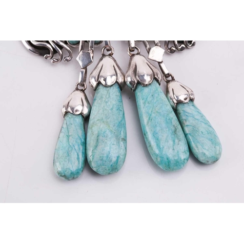 310 - Georg Jensen - a 'master brooch' of floral design, trefoil motifs set with amazonite cabochons and f... 