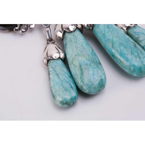 310 - Georg Jensen - a 'master brooch' of floral design, trefoil motifs set with amazonite cabochons and f... 