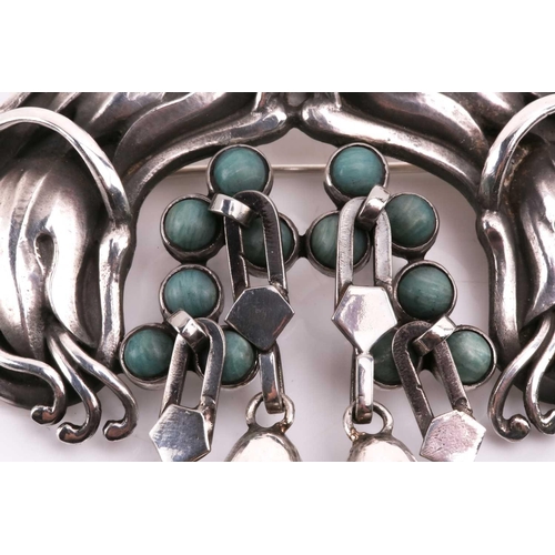 310 - Georg Jensen - a 'master brooch' of floral design, trefoil motifs set with amazonite cabochons and f... 