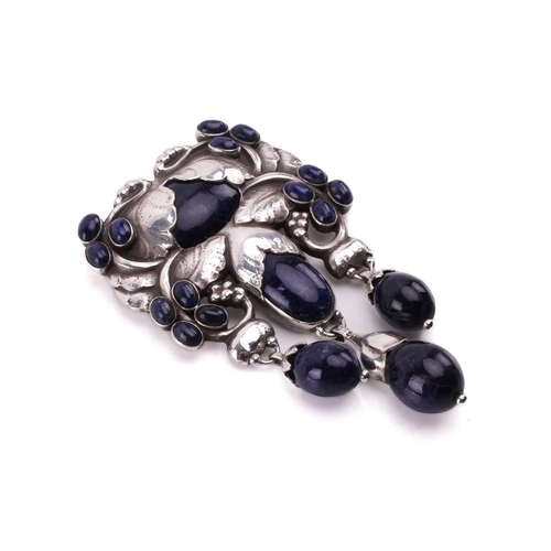 312 - Georg Jensen - a 'master brooch' of foliate design in sterling silver, set with sodalite cabochons a... 