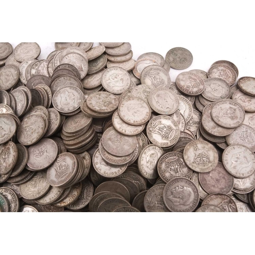 323 - A collection of pre-1947 silver one shillings, 74.3 ozt gross weight