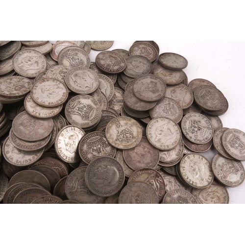 323 - A collection of pre-1947 silver one shillings, 74.3 ozt gross weight
